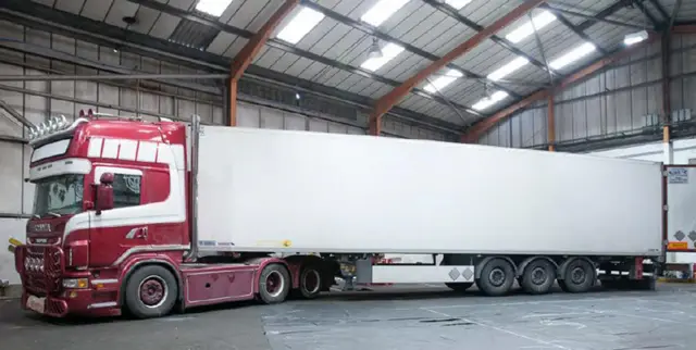 The lorry and its trailer