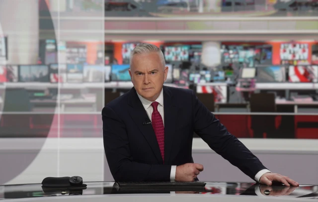 Huw Edwards presenting the Ten O'clock News in June 2022