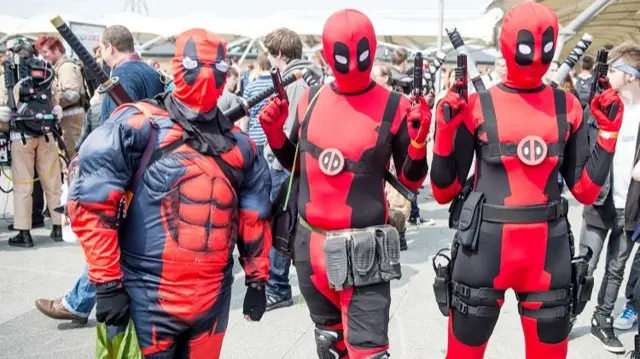 Deadpool fans in costume