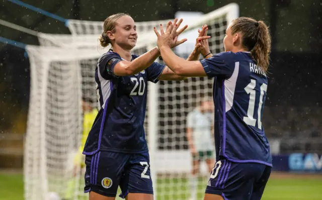 Martha Thomas celebrates with Kirsty Hanson