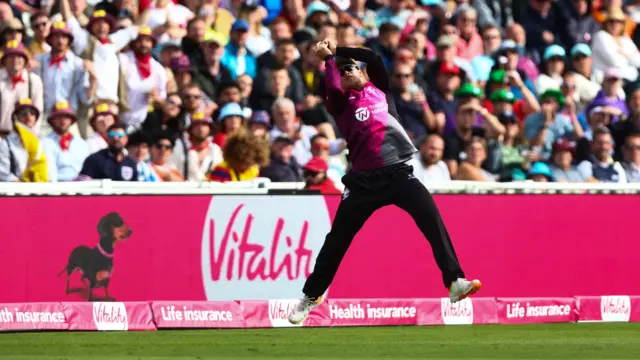 Will Smeed makes a catch on the boundary