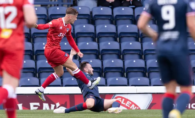 Dunfermline's Lewis McCann scores to make it 1-0