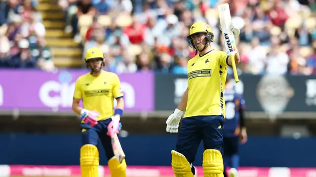 Joe Weatherley celebrates his 50 for Hampshire