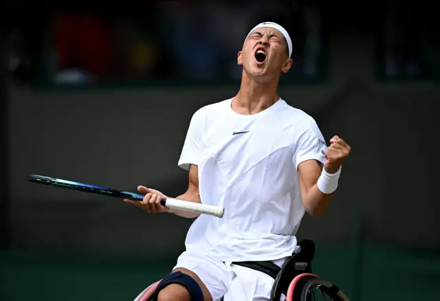 Tokito Oda roars in delight after winning a point