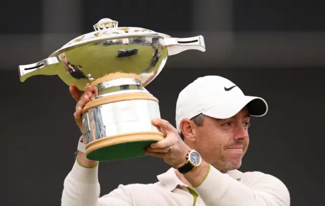 McIlroy lifts the trophy