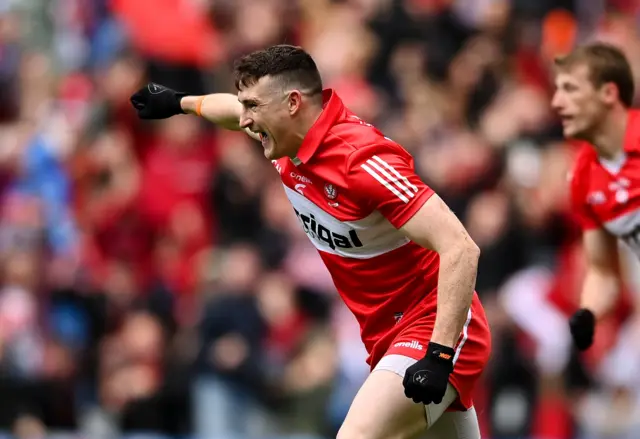 Gareth McKinless of Derry celebrates after scoring