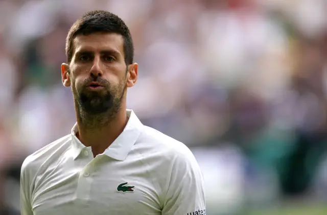 Novak Djokovic puff out his cheeks