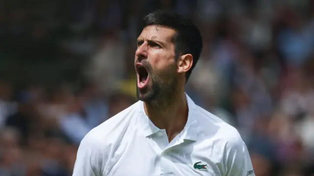 Novak Djokovic celebrates winning a point