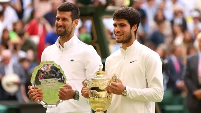 Djokovic and Alcaraz pose with their trophies