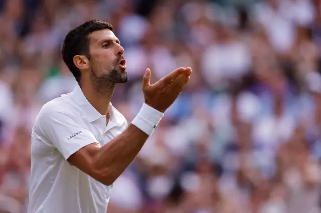 Novak Djokovic blows a kiss towards the Centre Court crowd