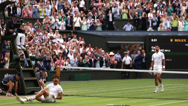 Carlos Alcaraz celebrates becoming Wimbledon champion