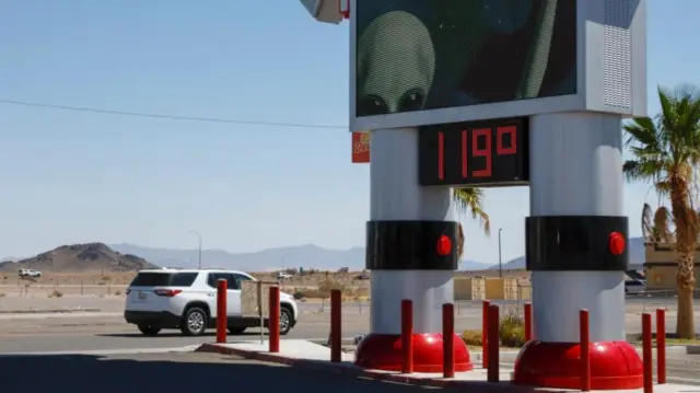 Temperature display reads 119 degrees, Baker, California, USA on 15 July, 2023.