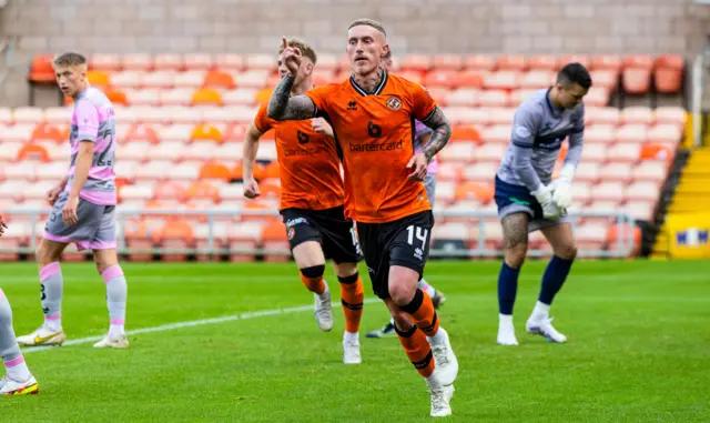 Dundee United's Craig Sibbald celebrates as he makes it 1-0