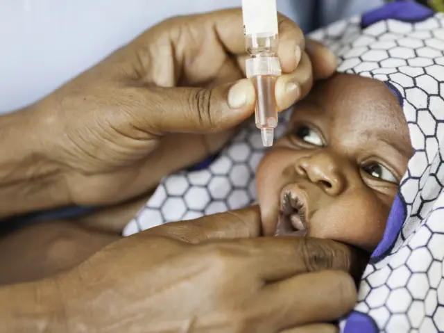 African baby receiving a vaccine