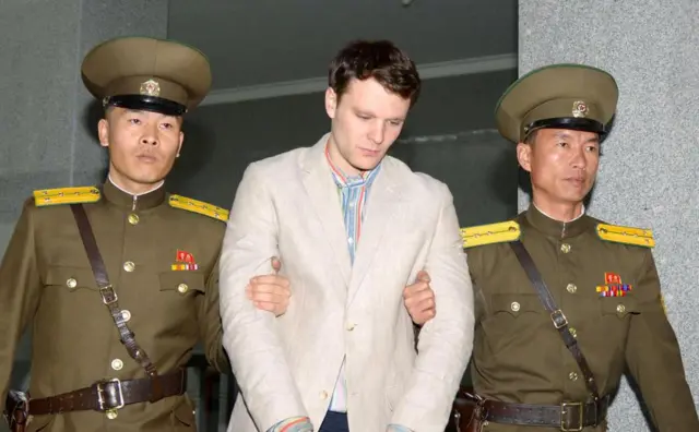 Otto Frederick Warmbier (C), a University of Virginia student who was detained in North Korea since early January, is taken to North Korea"s top court in Pyongyang, North Korea, in this photo released by Kyodo March 16, 2016.