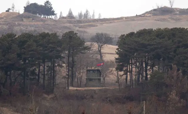 A North Korean guard post is seen from an South Korea's observation post inside the demilitarized zone (DMZ)