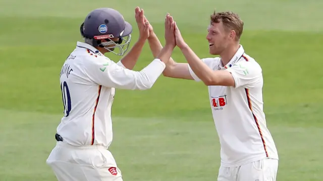 Jamie Porter celebrates taking a wicket