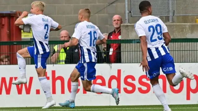 Tuomas Ollila celebrates his first-half goal with HJK Helsinki team-mates