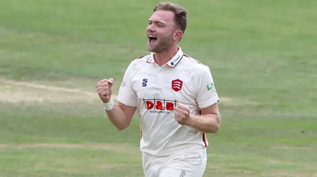 Sam Cook celebrates taking wicket