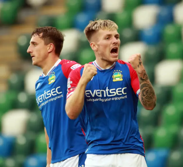 Chris McKee celebrates scoring for Linfield