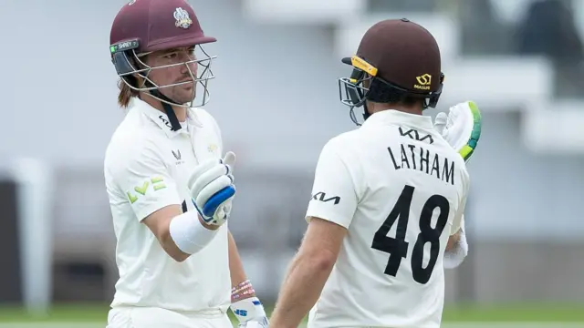 Rory Burns celebrates scoring fifty