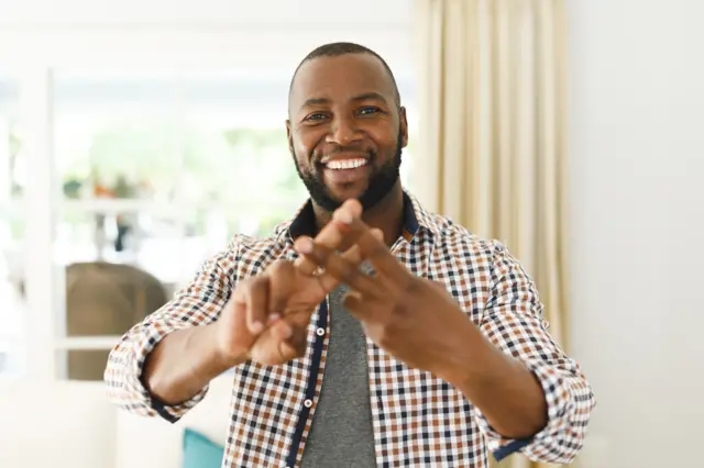 Man doing sign language in South Africa