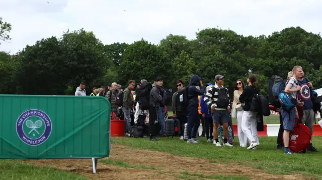 People queue for Wimbledon tickets