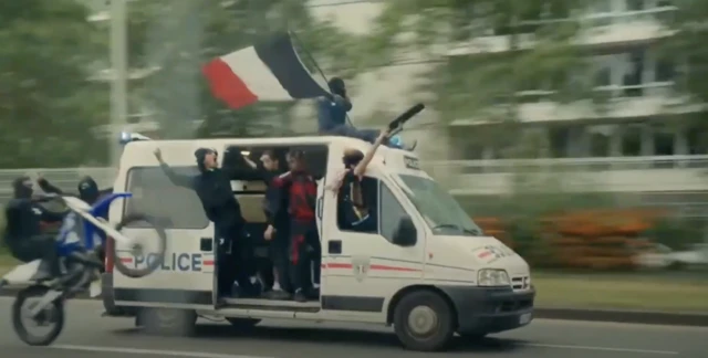 Still image, showing stolen French police van from a film 'Athena'