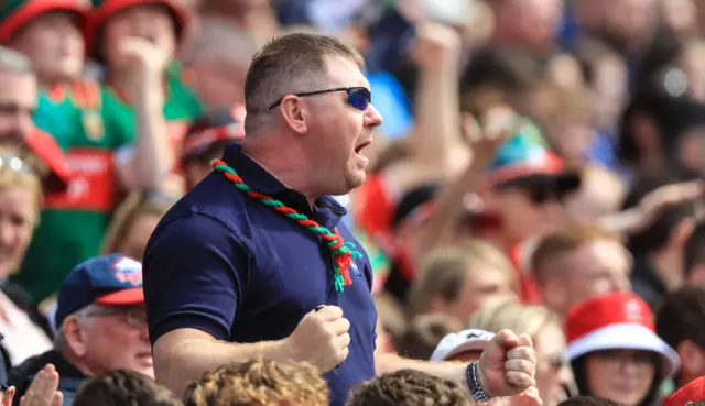 A Mayo fan celebrates a score