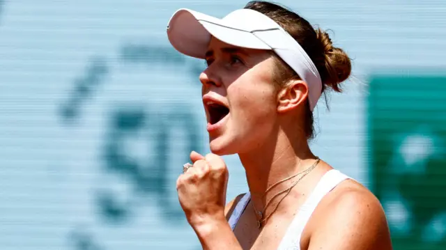 Elina Svitolina celebrates winning a point at the French Open