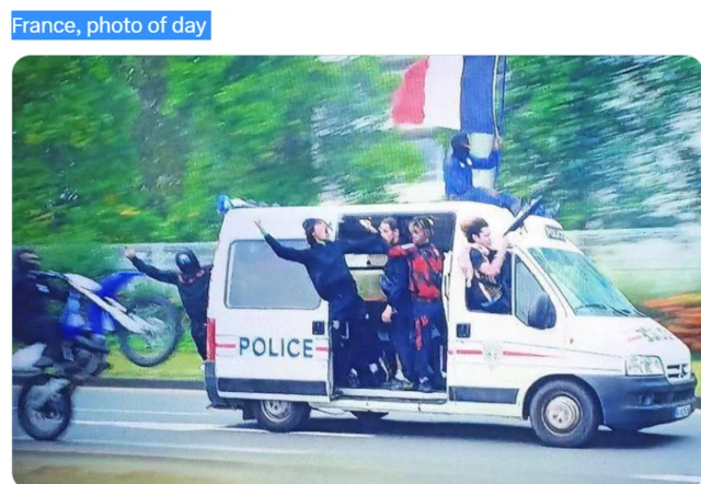 Tweet showing a stolen police van with caption: France, photo of day