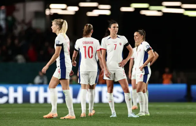 Norway players stand shellshocked after their surprise defeat.