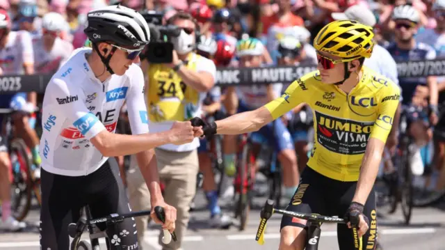 Pgacar and Vingegaard fist-bump on the start line