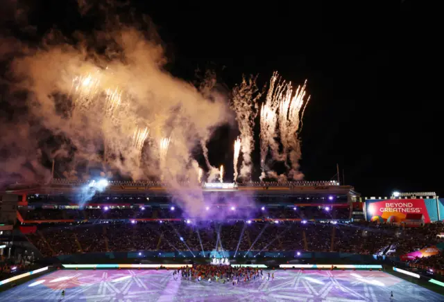 Fireworks from the top of the stadium signal the end of the ceremony.