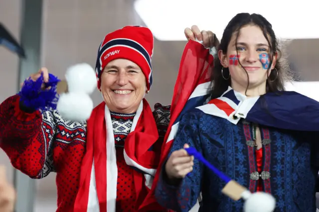 Norway fans smile ahead of kick off.