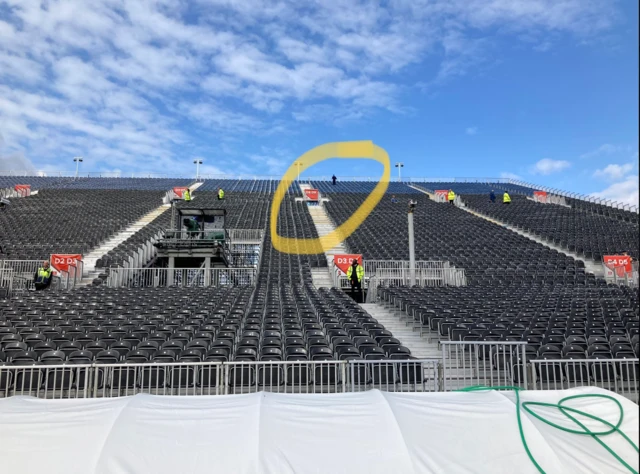 Man sat at the back of the party stand at Old Trafford