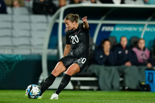 Indiah-Paige Riley moves to cross the ball into the box.