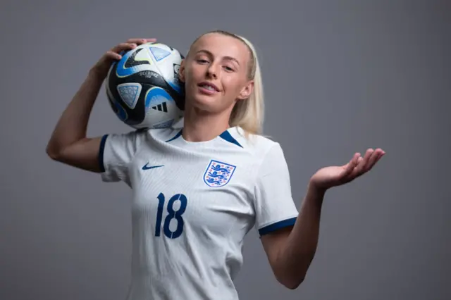 Chloe Kelly poses with the official world cup match ball.