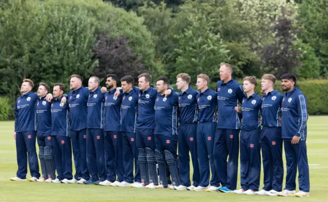 Scotland players line up for the national anthems