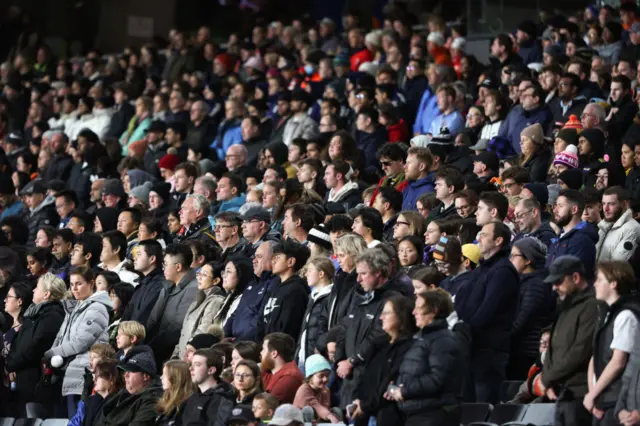 New Zealand fans watch on in hopeful anticipation.