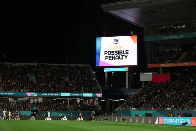 VAR pause the game to check for a penalty to New Zealand.