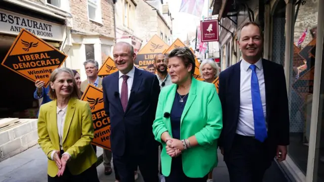 Sir Ed Davey walks with Sarah Dyke and other Lib Dems through Frome