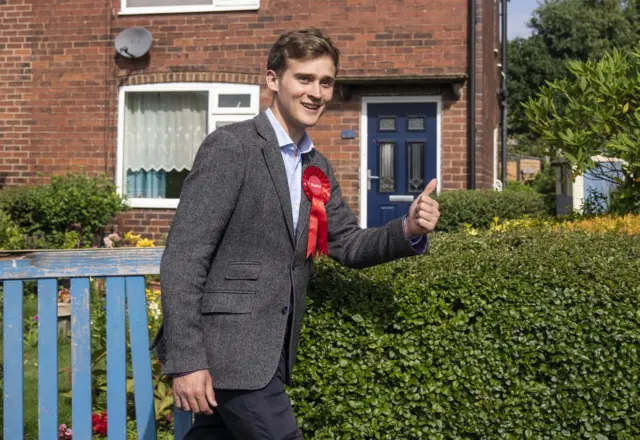 Labour's Keir Mather MP gives a thumbs-up sign