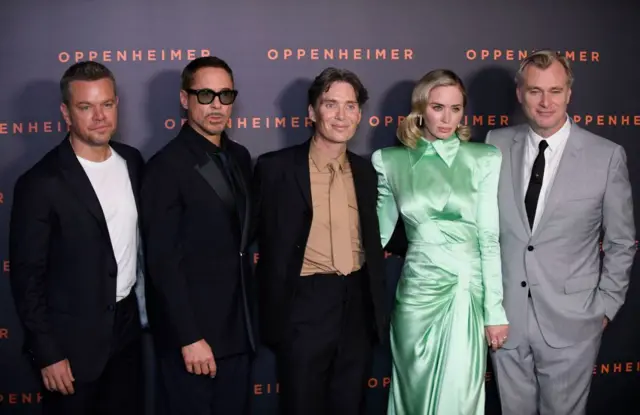 Matt Damon, Robert Downey Jr, Cillian Murphy, Emily Blunt and director Christopher Nolan pose at the Paris premiere