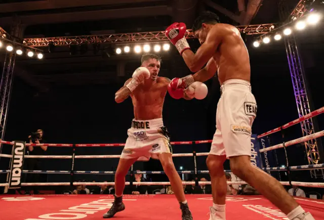 Lee McGregor and Erik Robles in action