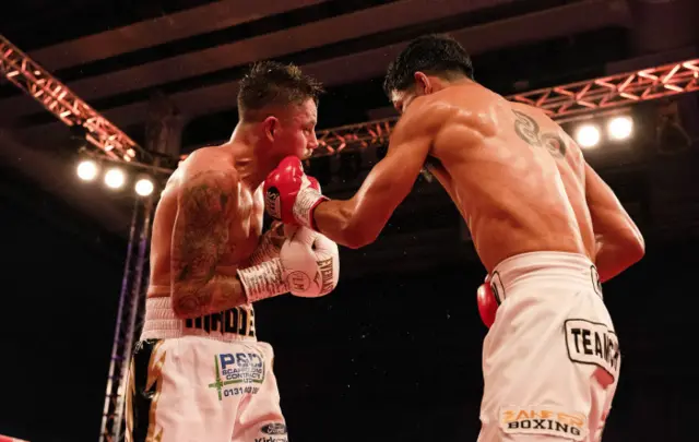 Lee McGregor and Erik Robles in action