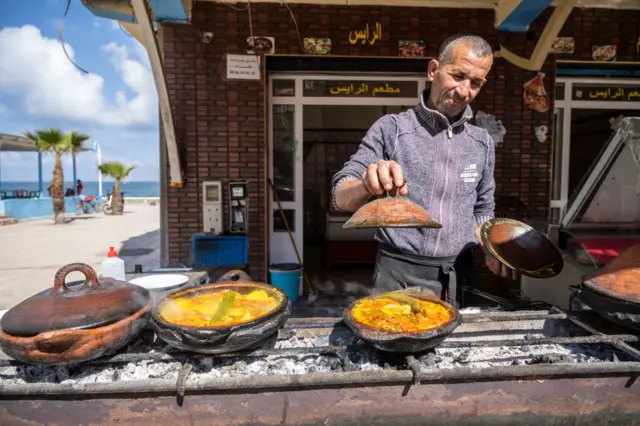 Man cooking a tagine