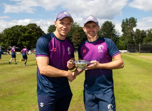 Richie Berrington is presented with a ceremonial quaich before play