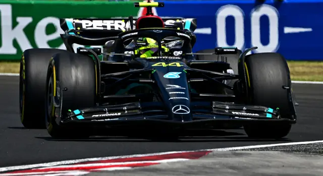 Lewis Hamilton drives his Mercedes F1 car