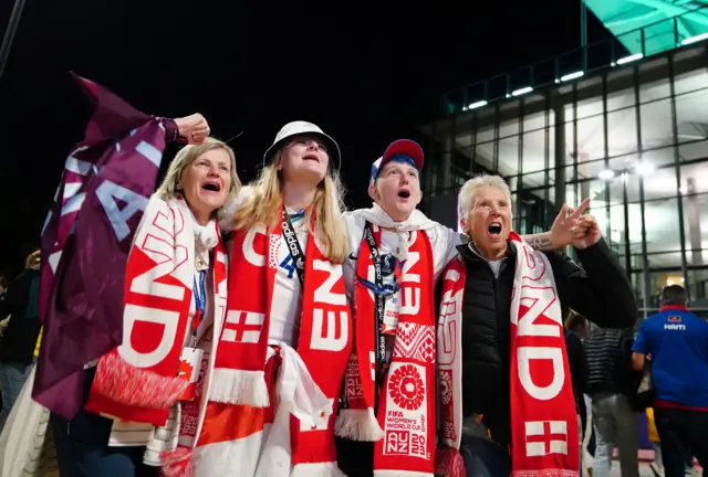 Aston Villa England fans cheer outside the stadium ahead of kick off.